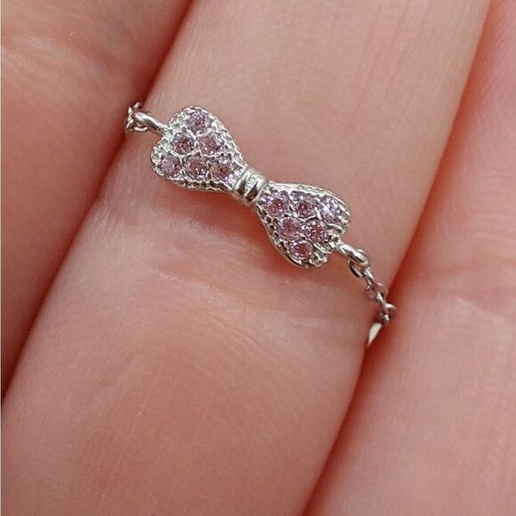 925 Sterling Silver Platinum Plated CZ Pink Bow Chain Ring - Picture 2 of 4